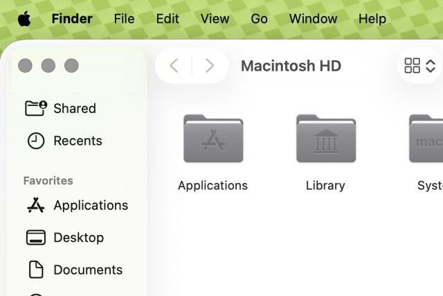 如何在macOS Tahoe中降低Liquid Glass透明效果